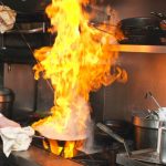 how to extinguish a kitchen stove fire